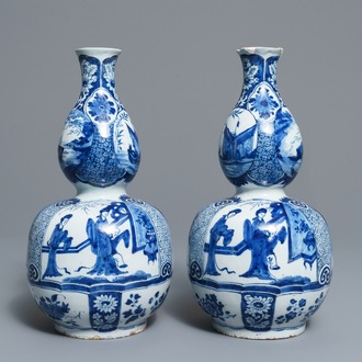 A pair of Dutch Delft blue and white double gourd chinoiserie vases, 18th C.